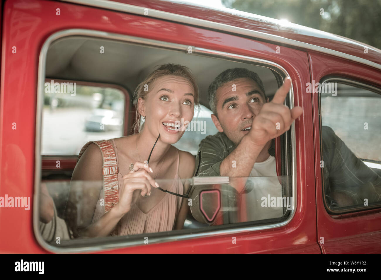 Married couple seeing the sights from the car. Stock Photo