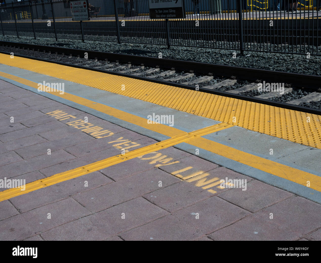 Stand behind yellow line sign hires stock photography and images Alamy