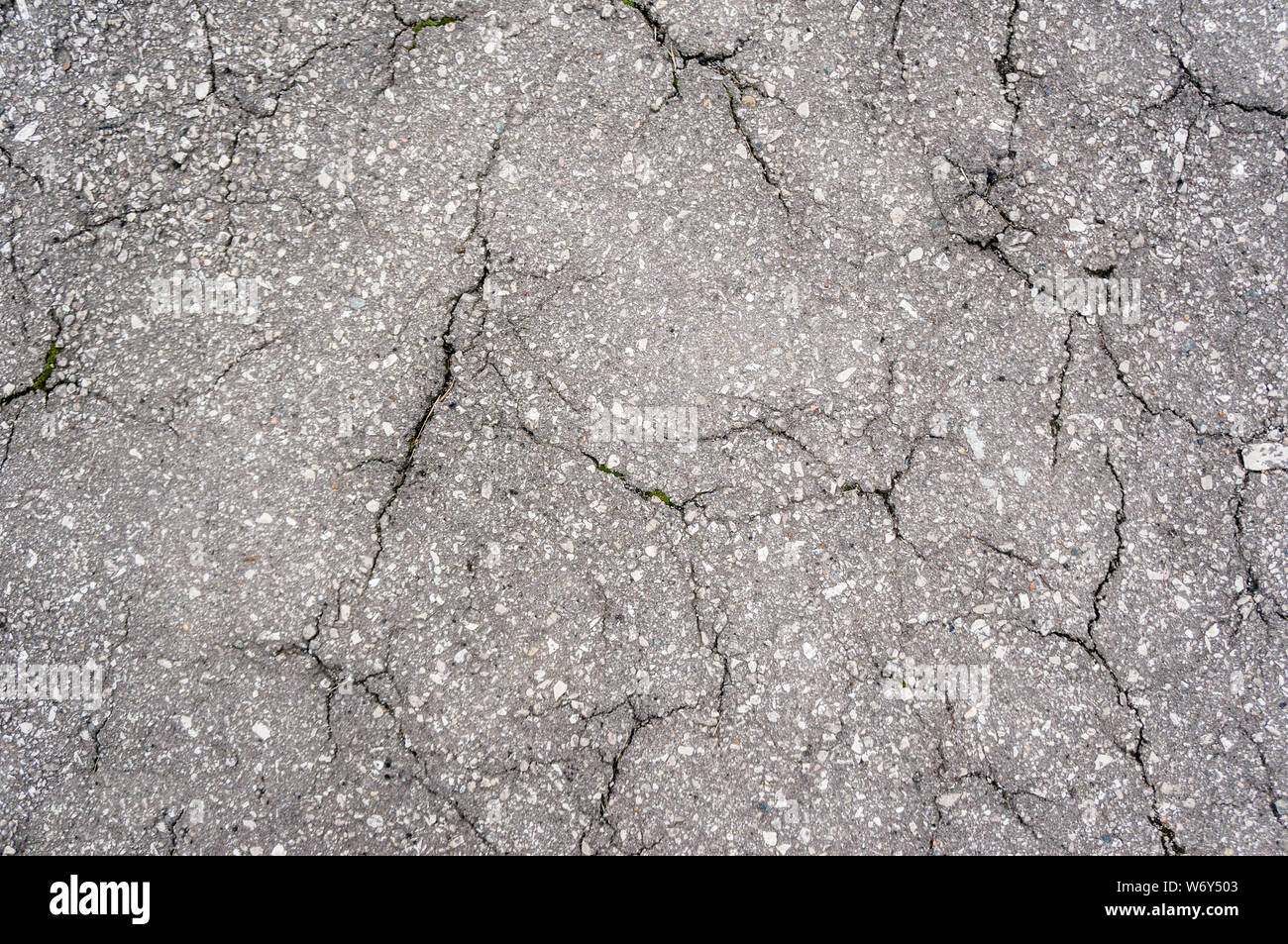 Asphalt in cracks. texture for background or design art work. Stock Photo