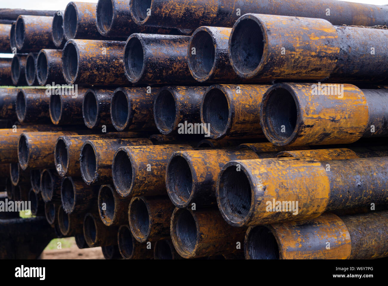 Oil Drill pipe. Rusty drill pipes were drilled in the well section