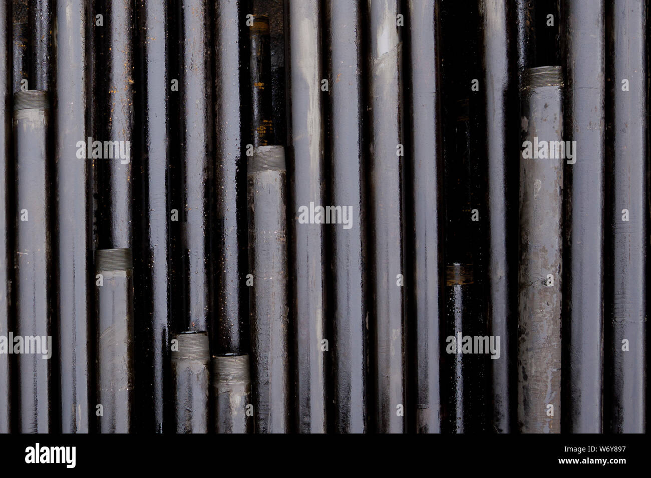 Oil Drill pipe. Rusty drill pipes were drilled in the well section