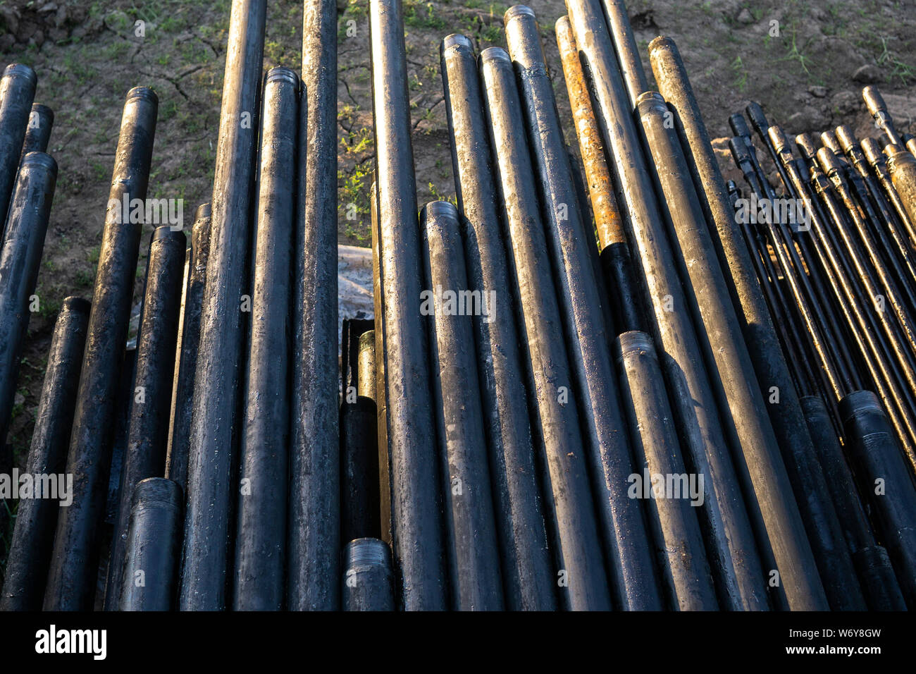 Oil Drill pipe. Rusty drill pipes were drilled in the well section