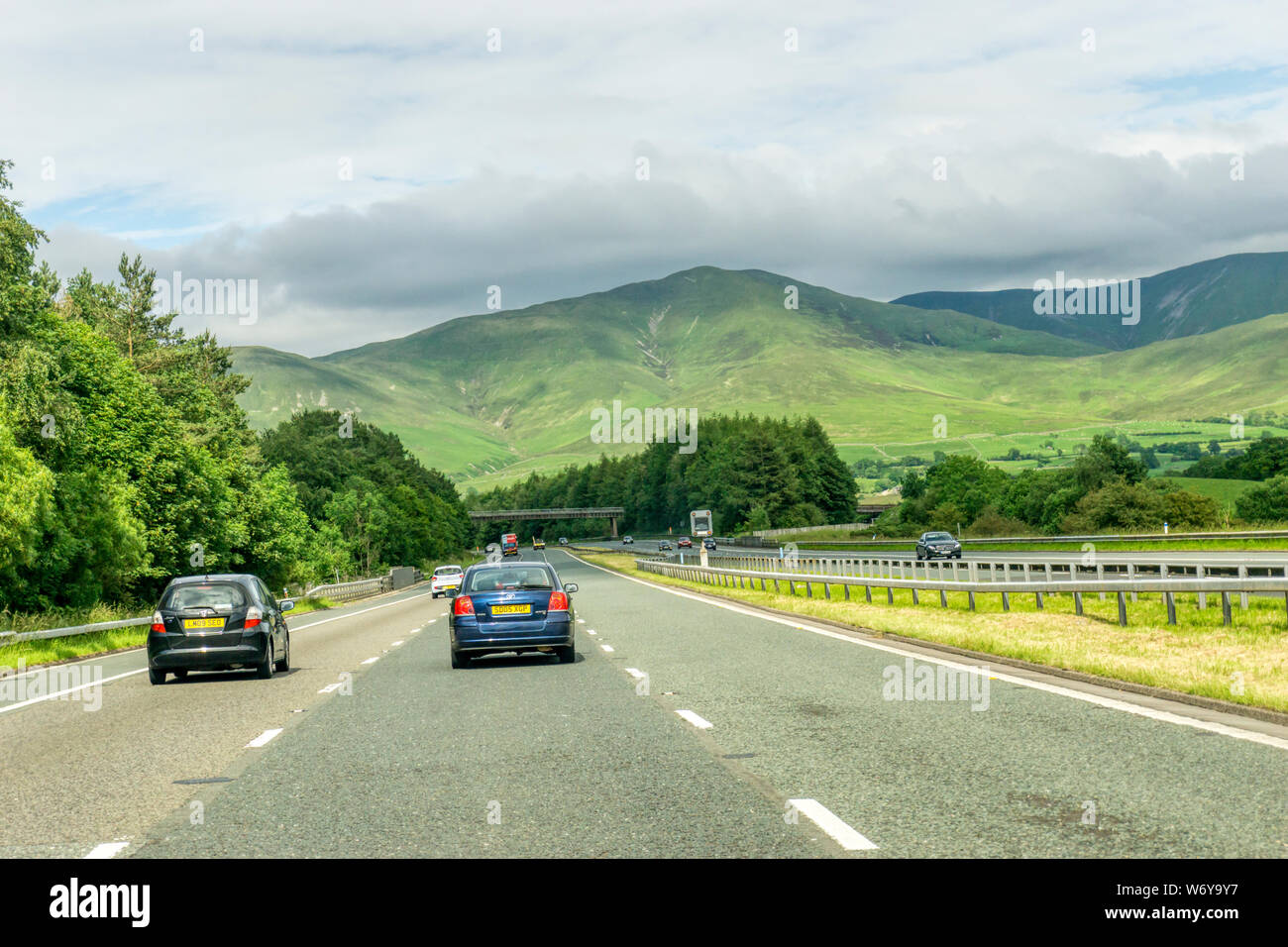 The M6 motorway to the east of Kendal northbound between J37 & J38 approaching Langdale Fell in the Howgill Fells. Stock Photo