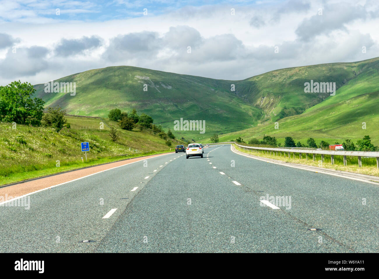 The M6 motorway to the east of Kendal northbound between J37 & J38 approaching Langdale Fell in the Howgill Fells. Stock Photo