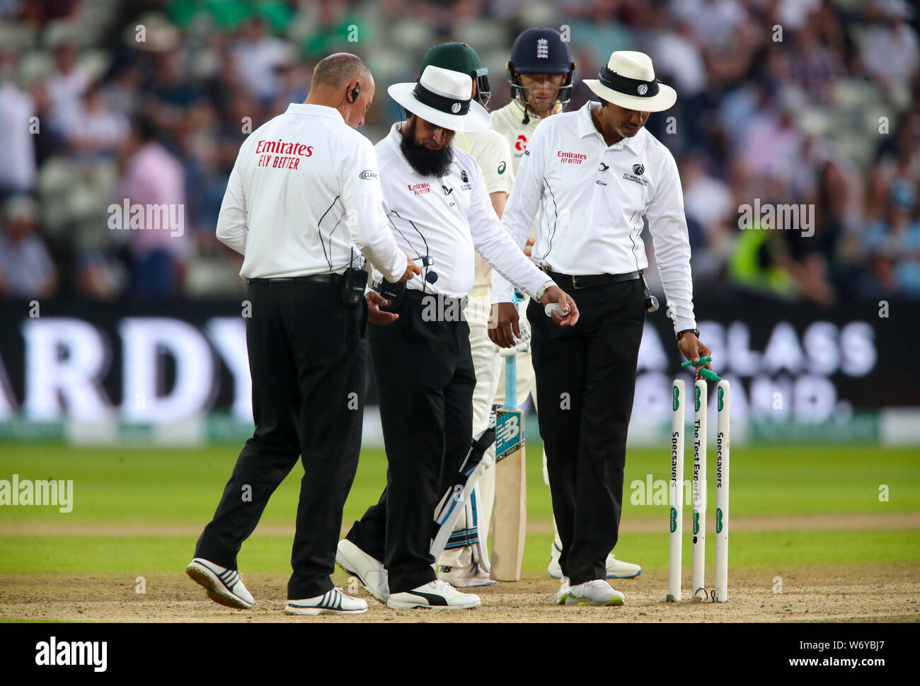 The umpires check the light during day three of the Ashes Test match at Edgbaston, Birmingham. Stock Photo
