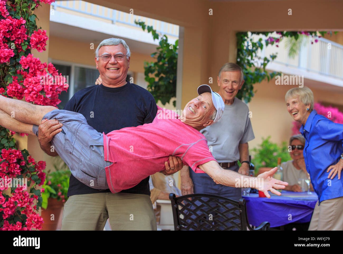 Happy senior people having fun at a party outside Stock Photo