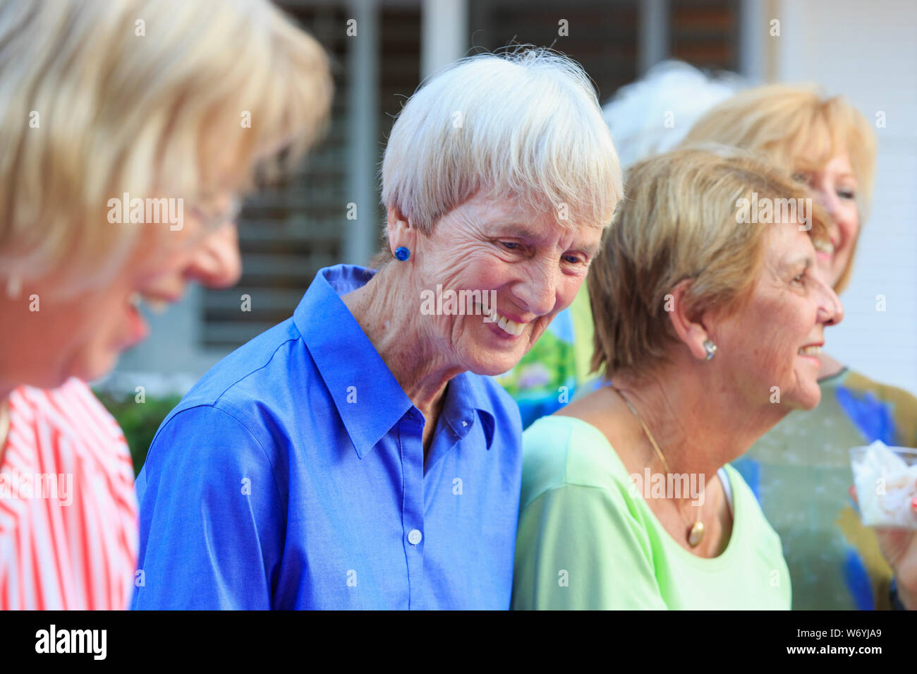 Happy senior women enjoying at a party Stock Photo