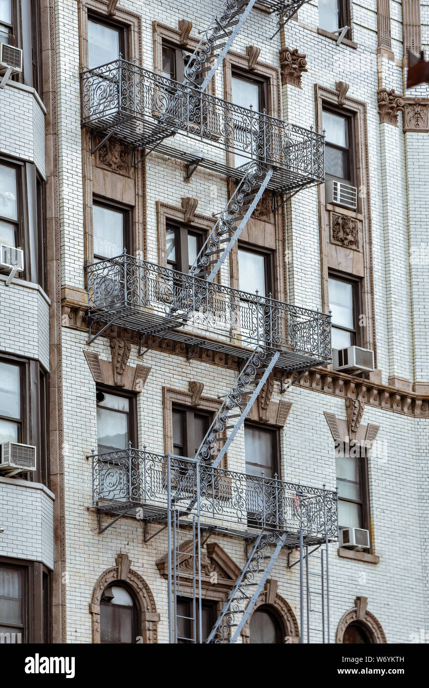 Facades of apartments, with fire stairs. Soho, Manhattan. NYC Stock