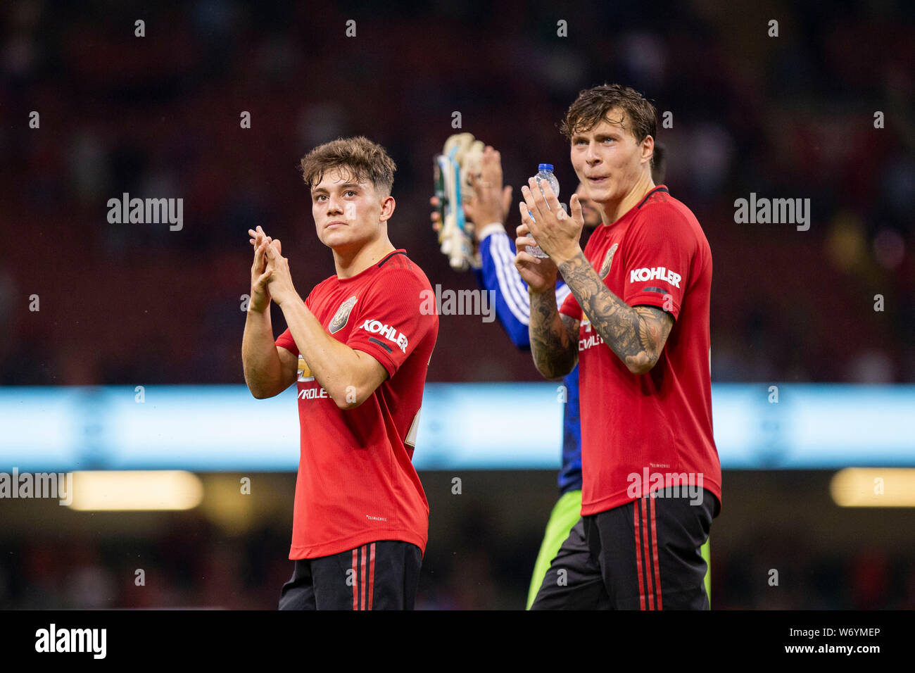 Cardiff, Wales, UK, August 3rd 2019. Dan James and Victor Lindelof of Manchester United claps the fans after the International Champions Cup match between Manchester United and AC Milan at the Principality Stadium in Cardiff. Credit: Mark Hawkins/Alamy Live News Credit: Mark Hawkins/Alamy Live News Stock Photo