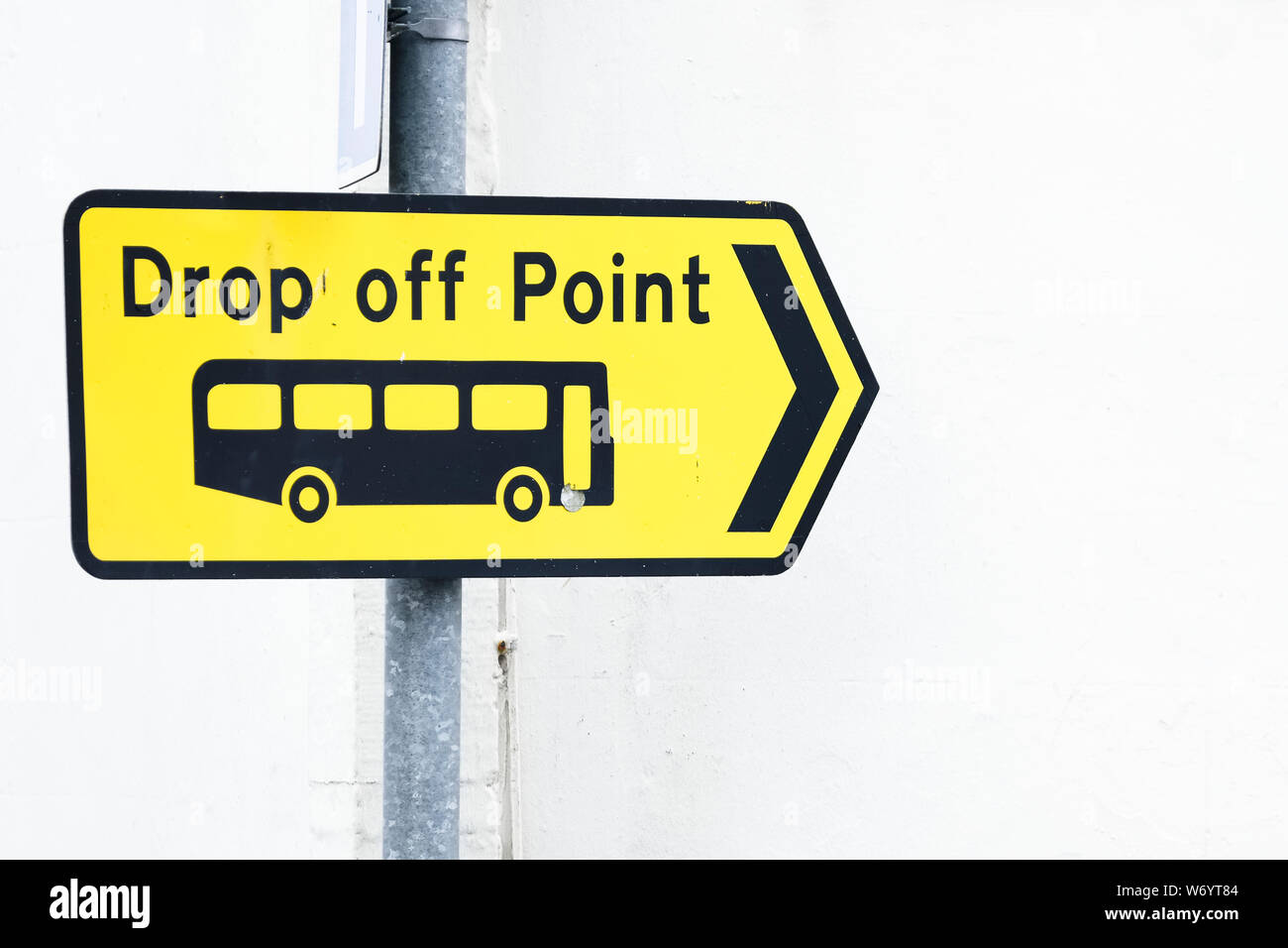 drop-off-point-yellow-direction-arrow-sign-stock-photo-alamy