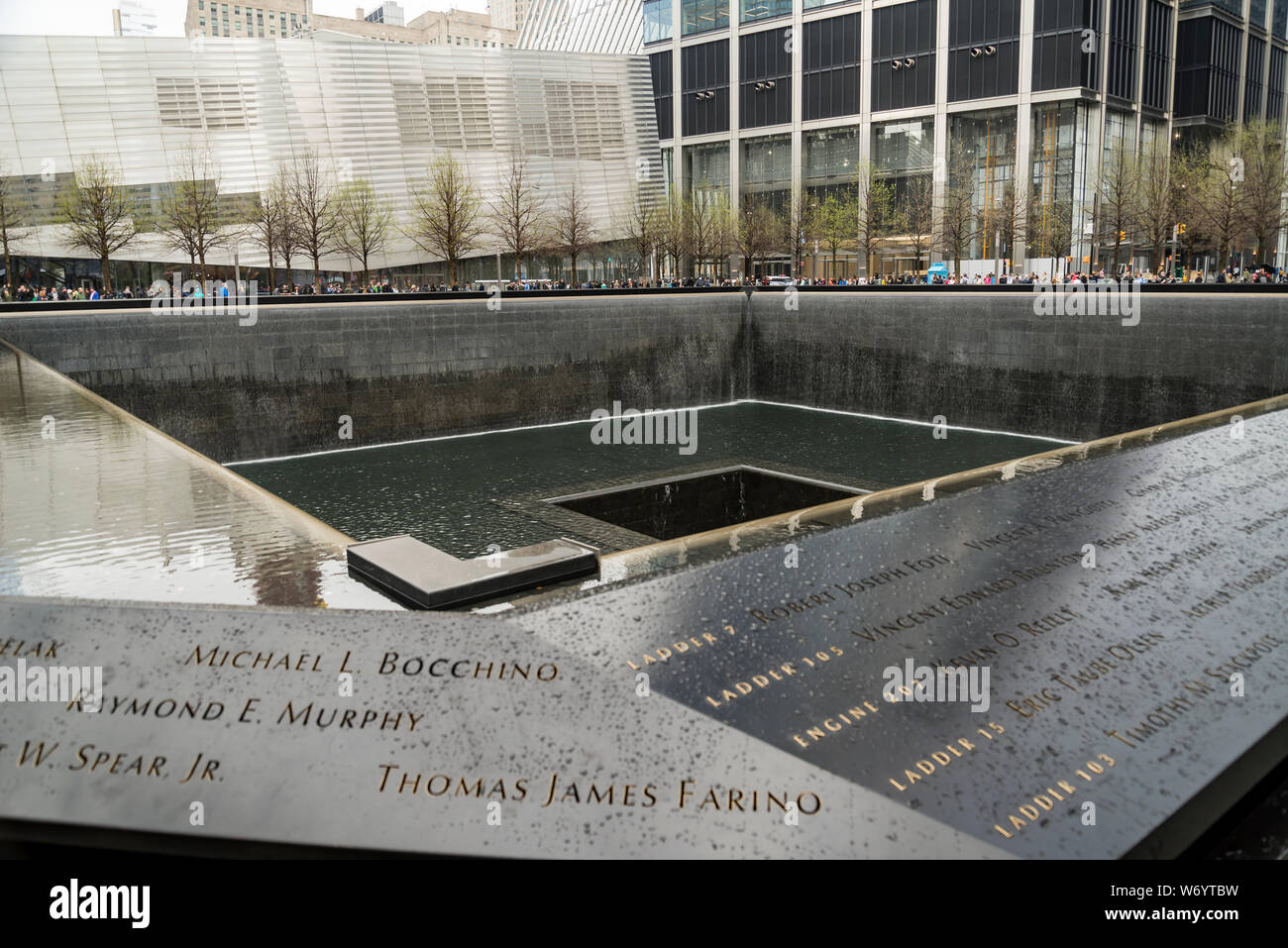 Names of victims inscribed on the bronze walls surrounding the south tower footprint at the 9 11 Memorial Stock Photo