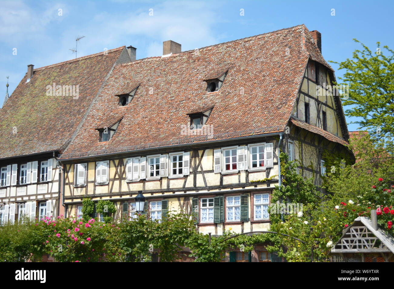 Beautiful traditional European style timber framing houses in city center of Wissembourg in France on a sunny day Stock Photo