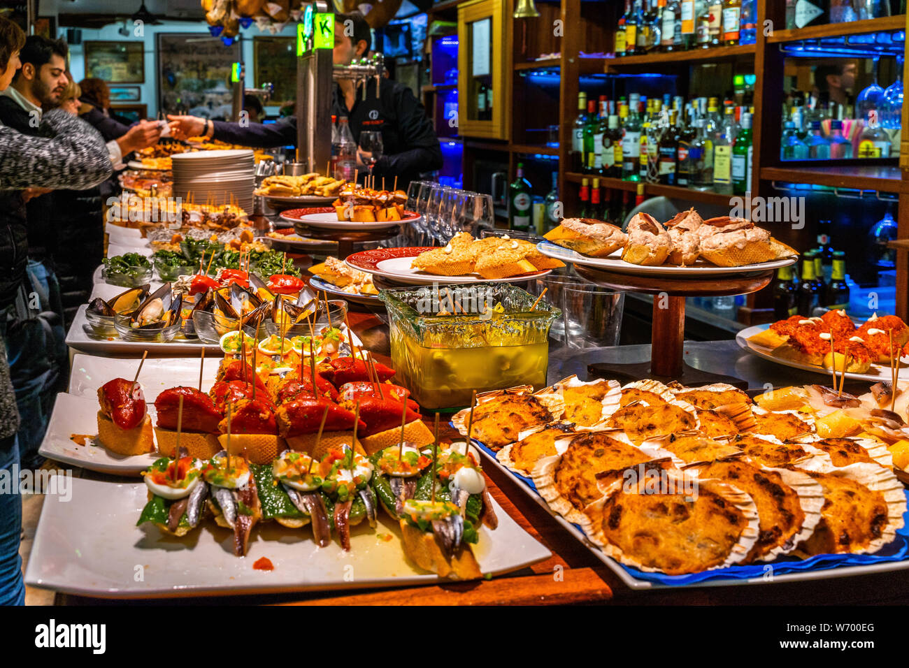 A tapas bar in San Sebastian with delicious pintxos, the traditional appetizers of the Basque A tapas bar in San Sebastian with delicious pintxos, the traditional appetizers of the Basque