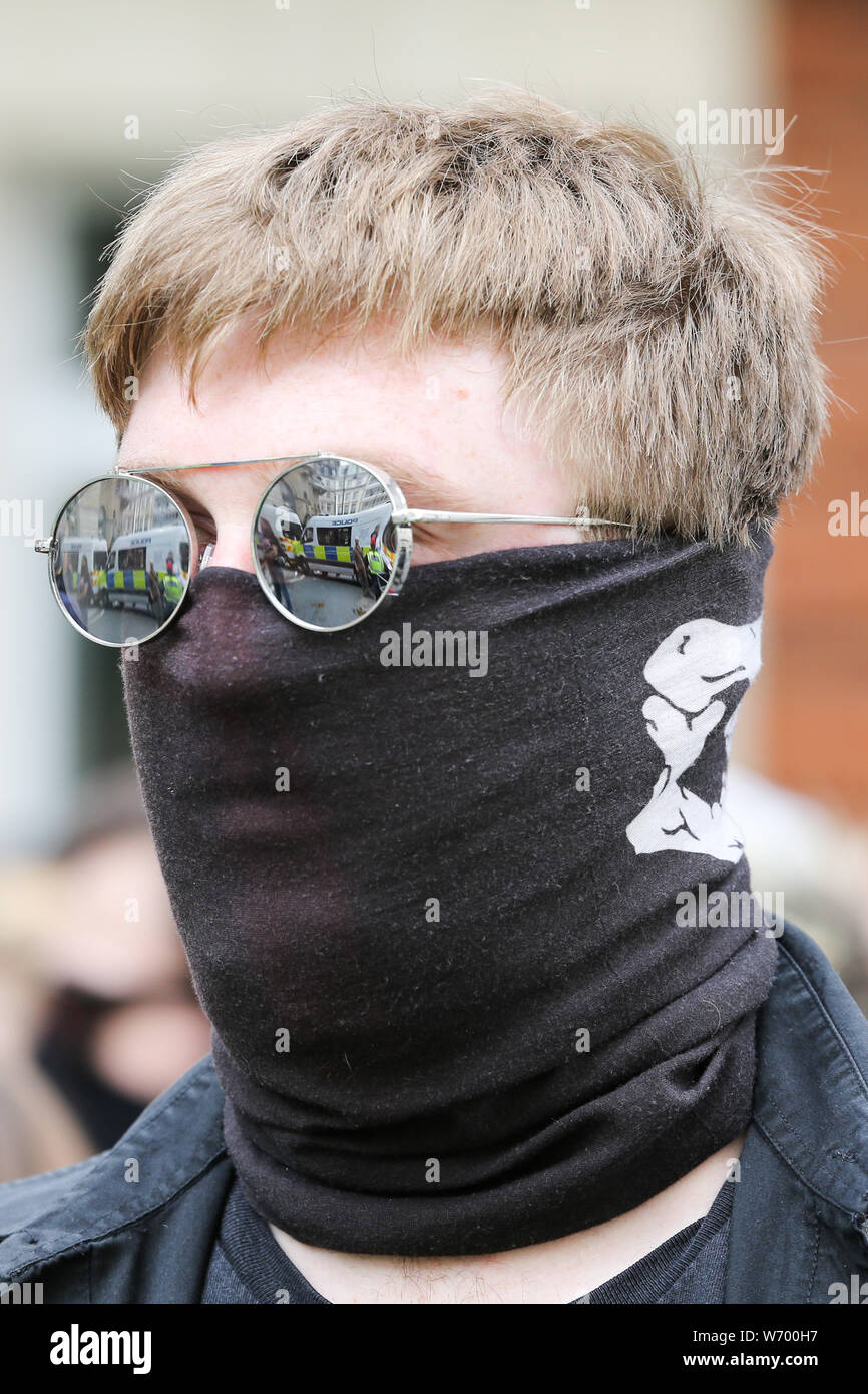 A counter-protester from Stop Tommy Robinson and Stand up to Racism takes part during the demonstration.A rally in support of the British far-right Stephen Yaxley-Lennon, also known as Tommy Robinson in central London. Tommy Robinson was jailed on 11 July 2019 at Old Bailey for contempt of court. Stock Photo