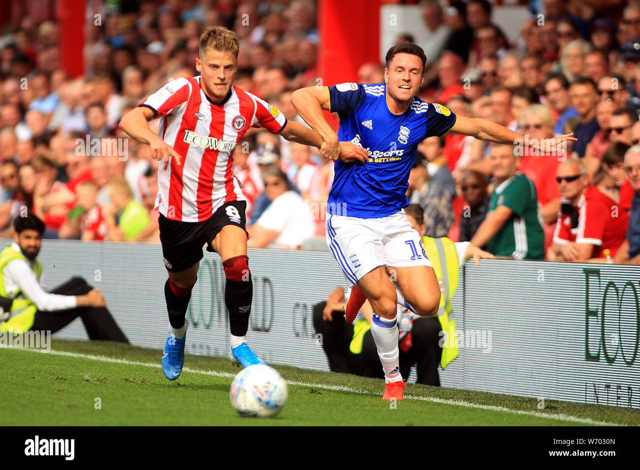 London, UK. 03rd Aug, 2019. Kerim Mrabti of Birmingham City (R) in action with Mathias Jensen of Brentford (L). EFL Skybet championship match, Brentford v Birmingham City at Griffin Park stadium in London on Saturday 3rd August 2019. this image may only be used for Editorial purposes. Editorial use only, license required for commercial use. No use in betting, games or a single club/league/player publications. pic by Steffan Bowen/Andrew Orchard sports photography/Alamy Live news Credit: Andrew Orchard sports photography/Alamy Live News Stock Photo