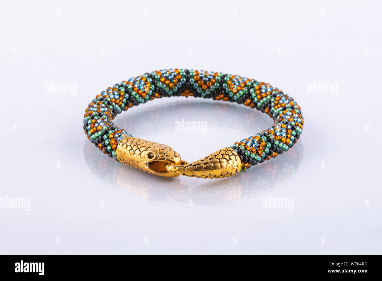 Small designer bead bracelet with snake clasp Stock Photo Alamy