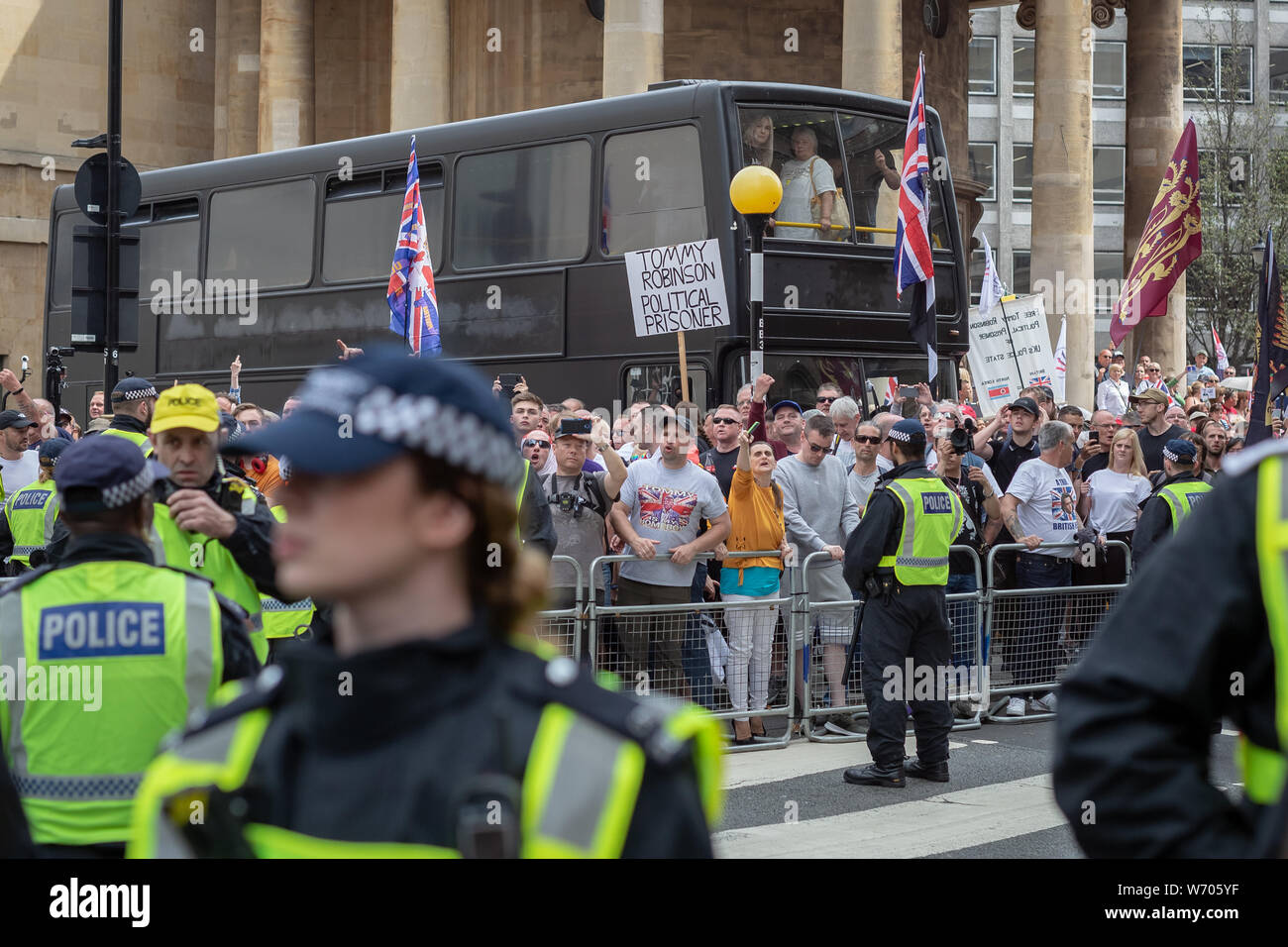 London, UK. 3rd August, 2019. 'Free Tommy Robinson' protest. Police arrest twenty four during a mass demonstration in support of the jailed Tommy Robinson, real name Stephen Yaxley-Lennon, who was sentenced last month to nine months in prison after being found guilty in contempt of court. Counter-protesters including antifascist activists and the anti-racist group: Stand Up to Racism, opposed the pro-Robinson demonstrators with protest groups kept apart by met police with some clashes. Credit: Guy Corbishley/Alamy Live News Stock Photo