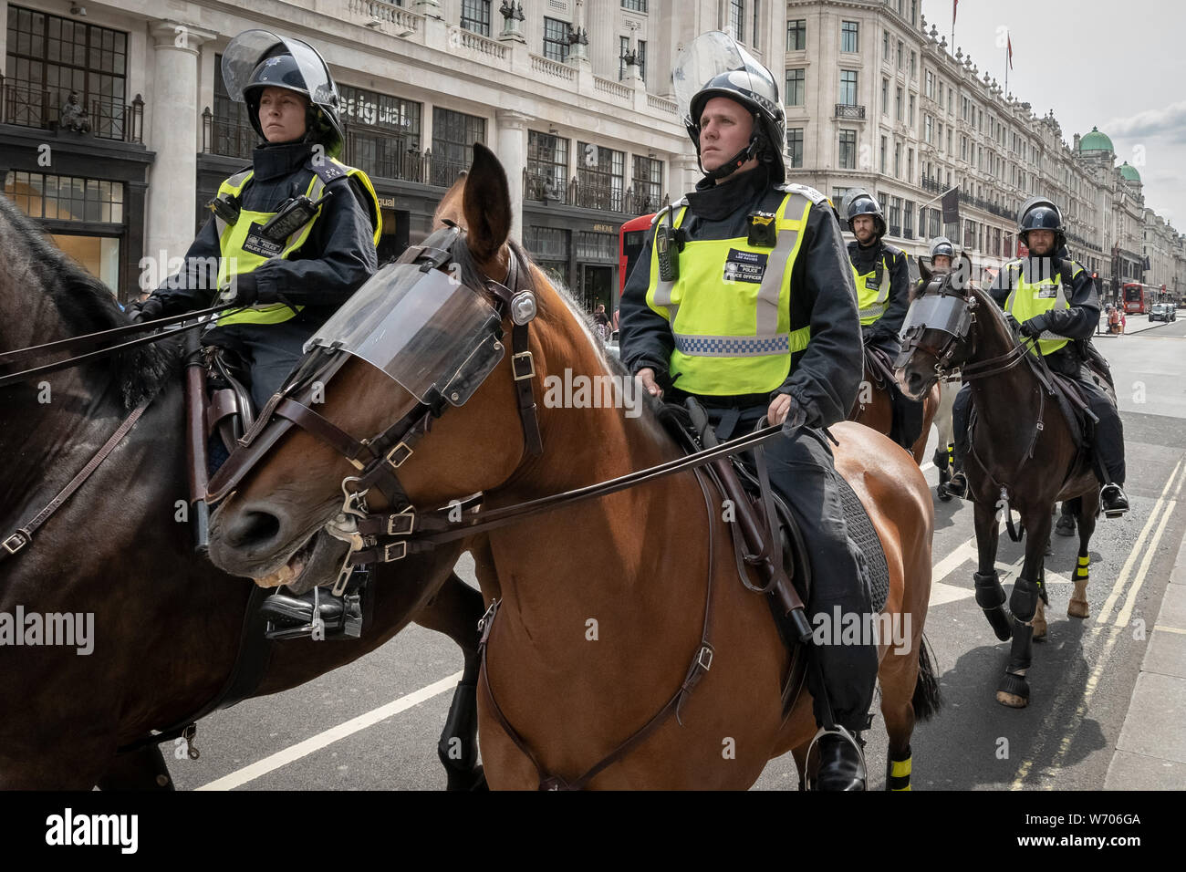 London, UK. 3rd August, 2019. Anti-fascists clash with police whilst counter-protesting the 'Free Tommy Robinson' demonstration. Police arrest twenty four during a mass demonstration in support of the jailed Tommy Robinson, real name Stephen Yaxley-Lennon, who was sentenced last month to nine months in prison after being found guilty in contempt of court. Counter-protesters including antifascist activists and the anti-racist group: Stand Up to Racism, opposed the pro-Robinson demonstrators with protest groups kept apart by met police. Credit: Guy Corbishley/Alamy Live News Stock Photo