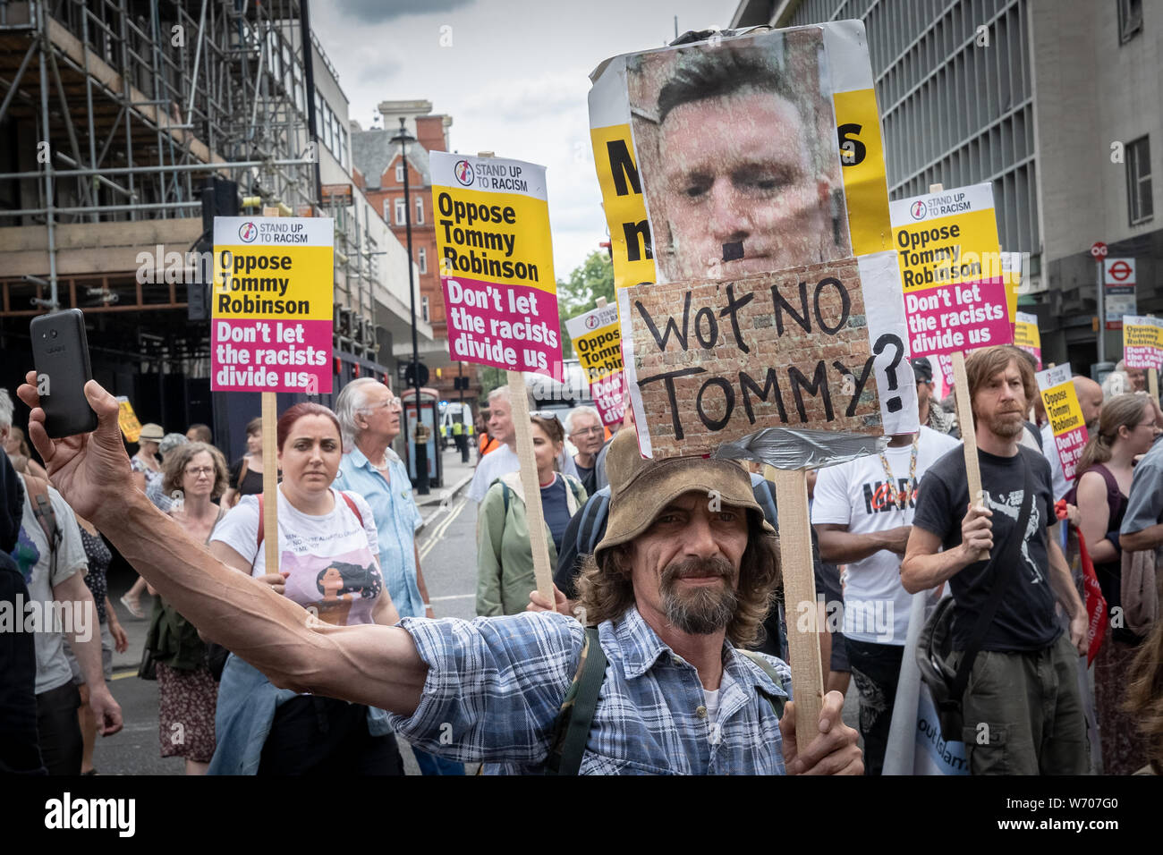 London, UK. 3rd August, 2019. Anti-fascists clash with police whilst counter-protesting the 'Free Tommy Robinson' demonstration. Police arrest twenty four during a mass demonstration in support of the jailed Tommy Robinson, real name Stephen Yaxley-Lennon, who was sentenced last month to nine months in prison after being found guilty in contempt of court. Counter-protesters including antifascist activists and the anti-racist group: Stand Up to Racism, opposed the pro-Robinson demonstrators with protest groups kept apart by met police. Credit: Guy Corbishley/Alamy Live News Stock Photo