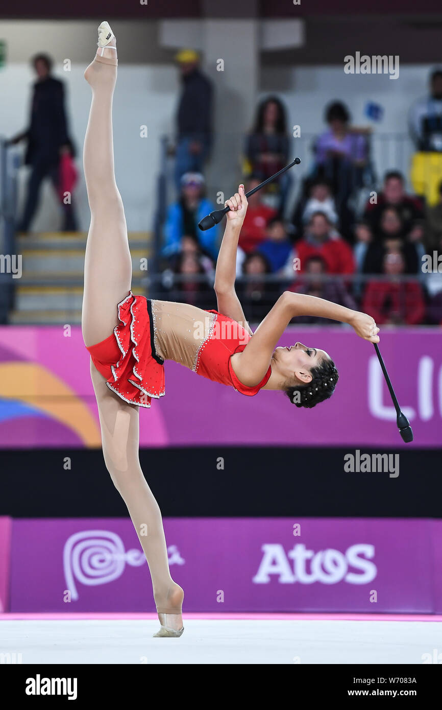 Lima, Peru. 3rd Aug, 2019. CARLA CORMINBOEUF from Peru competes in the individual All-Around with the clubs during the competition held in the Polideportivo Villa El Salvador in Lima, Peru. Credit: Amy Sanderson/ZUMA Wire/Alamy Live News Stock Photo