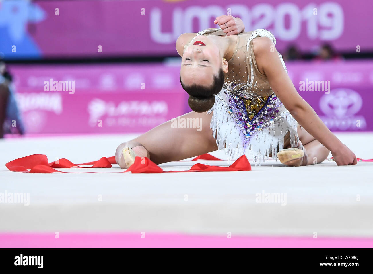 Lima, Peru. 3rd Aug, 2019. CAMILLA FEELEY from the US competes in the individual All-Around with the ribbon during the competition held in the Polideportivo Villa El Salvador in Lima, Peru. Credit: Amy Sanderson/ZUMA Wire/Alamy Live News Stock Photo