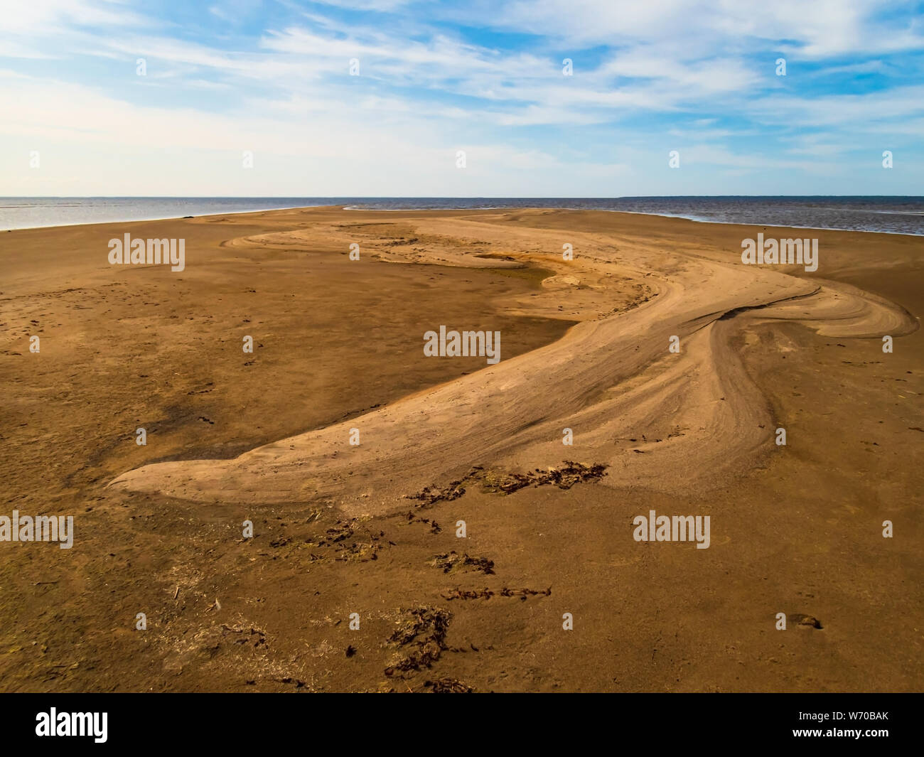 The seafront in summer on Santonen beach on Hailuoto island and during shallow water come sand bar, North Ostrobothnia, Finland Stock Photo