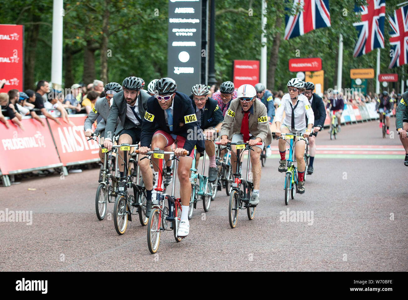 London, UK. 3 August 2019. People take part in the 14th Brompton World Championship Final, part of Prudential RideLondon, riding a 1.3km circuit around St James's Park. Credit: Quan Van/ Alamy Live News Stock Photo