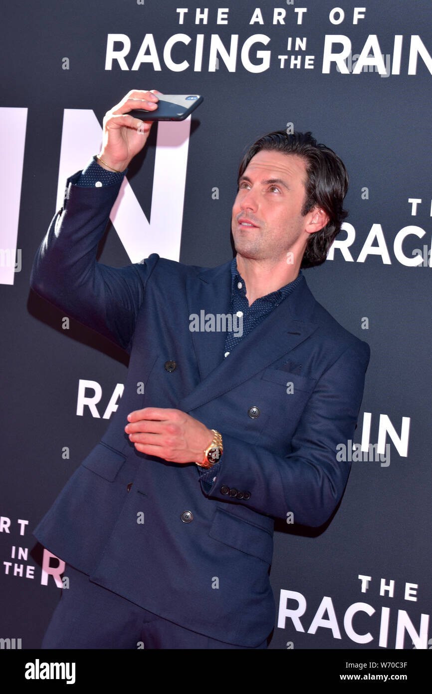 HOLLYWOOD, CA - AUGUST 01: Milo Ventimiglia arrives for the Premiere Of 20th Century Fox's "The Art Of Racing In The Rain" held at El Capitan Theatre Stock Photo