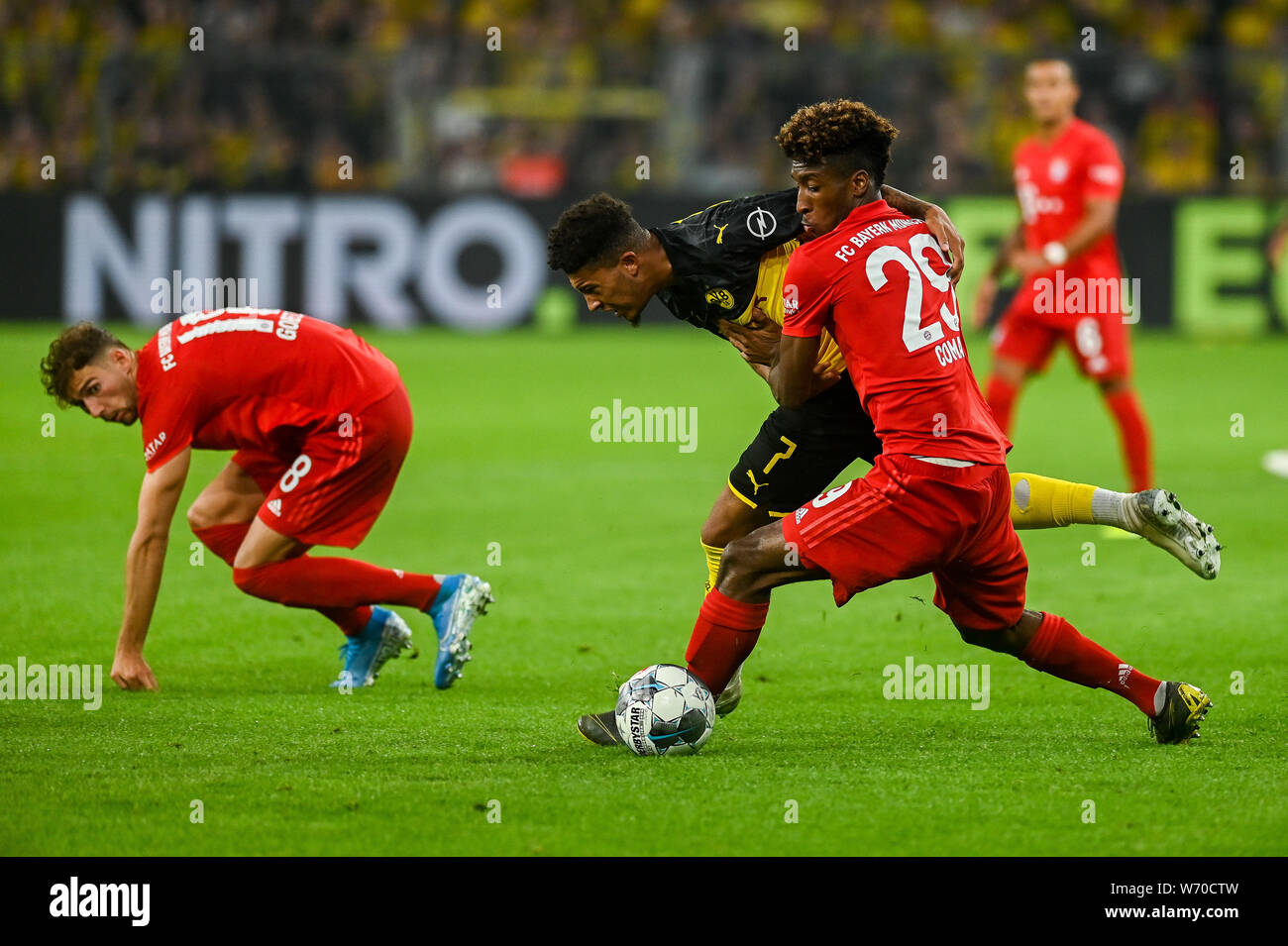 Jadon Sancho from Borussia Dortmund (L) and Kingsley Coman from Bayern Munich (R) are seen in action during the Germany Supercup Final 2019 match between Borussia Dortmund and Bayern Munich(Final score: Borussia Dortmund 2:0 Bayern Munich) Stock Photo