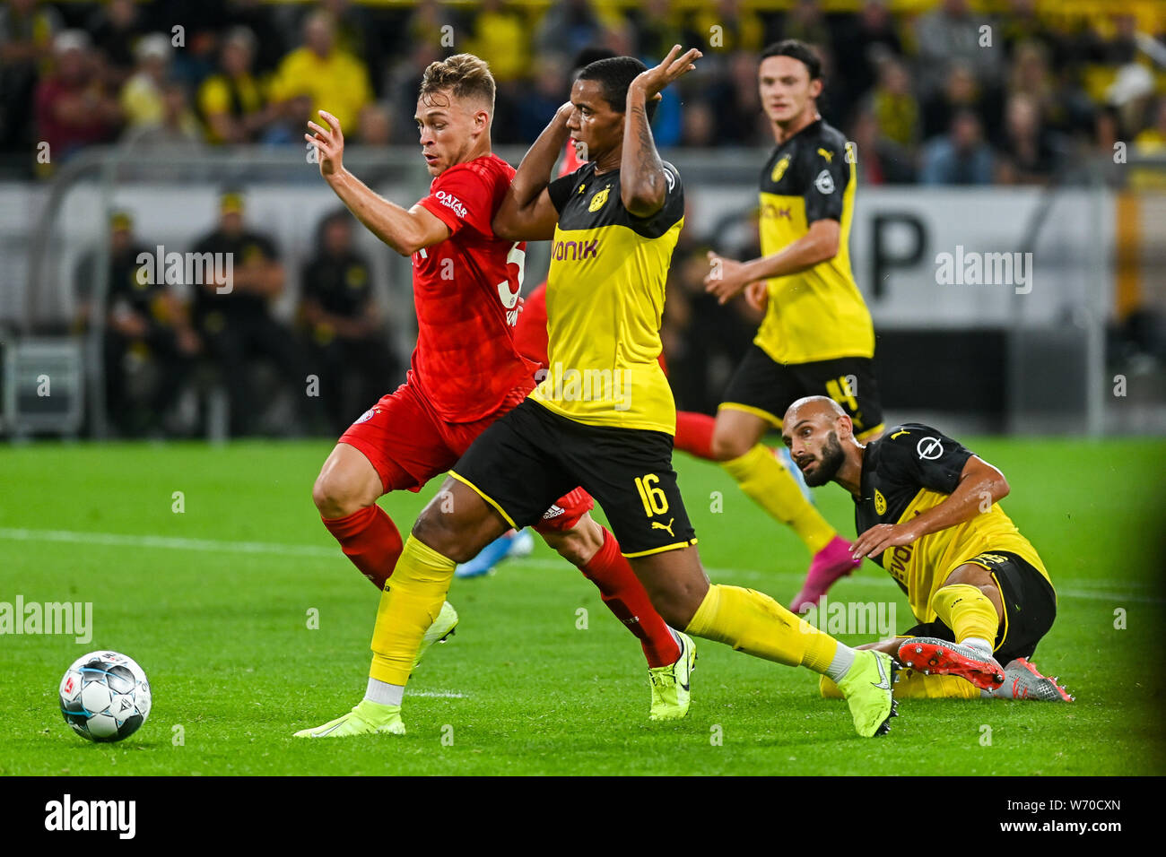 Joshua Kimmich from Bayern Munich (L) and Manuel Akanji from Borussia Dortmund (R) are seen in action during the Germany Supercup Final 2019 match between Borussia Dortmund and Bayern Munich.(Final score: Borussia Dortmund 2:0 Bayern Munich) Stock Photo
