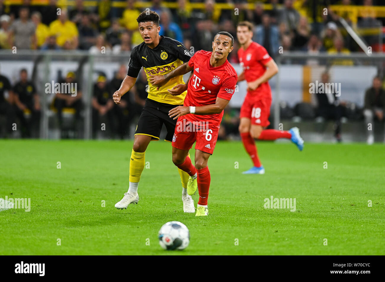 Jadon Sancho from Borussia Dortmund (L) and Thiago from Bayern Munich (R) are seen in action during the Germany Supercup Final 2019 match between Borussia Dortmund and Bayern Munich.(Final score: Borussia Dortmund 2:0 Bayern Munich) Stock Photo