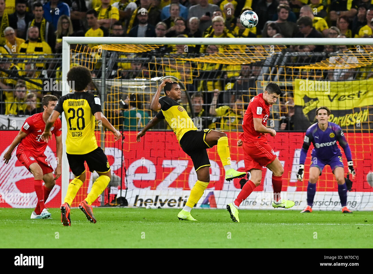 Jadon Sancho from Borussia Dortmund (L) and Robert Lewandowski from Bayern Munich (R) are seen in action during the Germany Supercup Final 2019 match between Borussia Dortmund and Bayern Munich.(Final score: Borussia Dortmund 2:0 Bayern Munich) Stock Photo