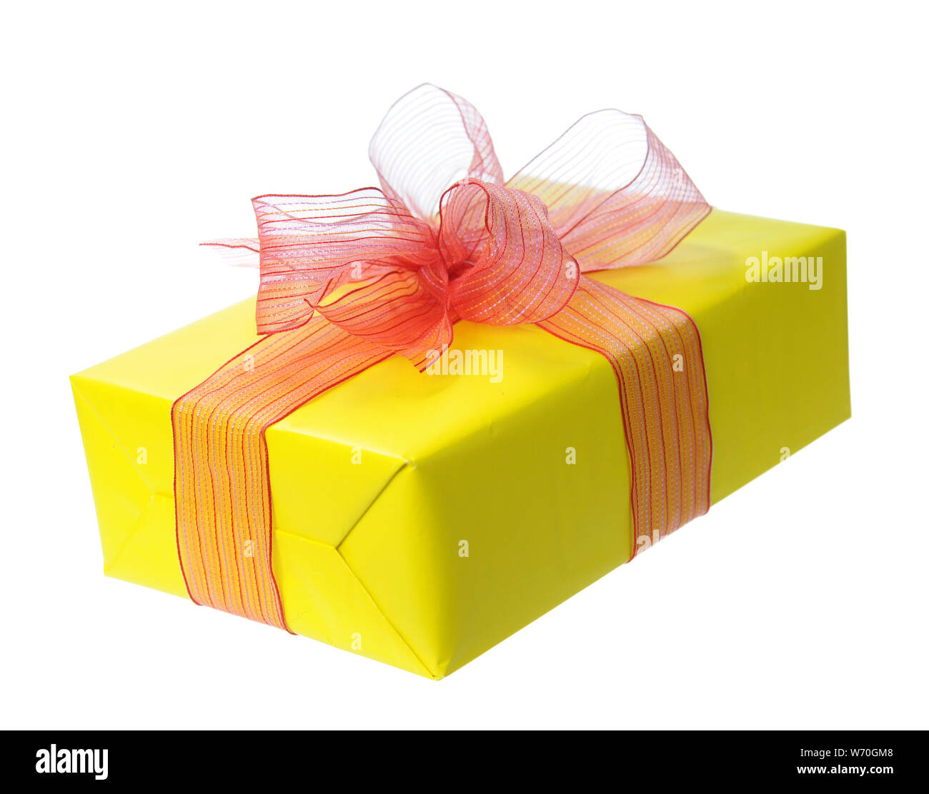Yellow gift box isolated on white Stock Photo