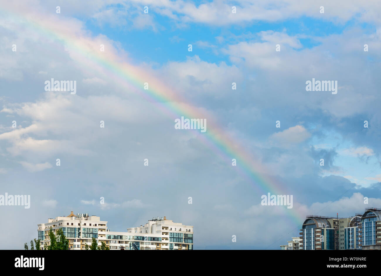 Beautiful rainbow after a thunderstorm in the city of Kiev Stock Photo ...