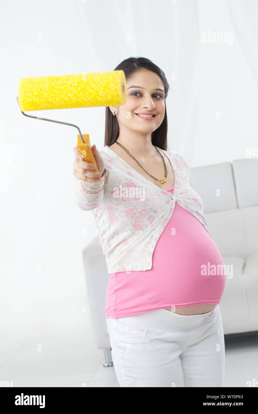 Baby bump paint hires stock photography and images Alamy