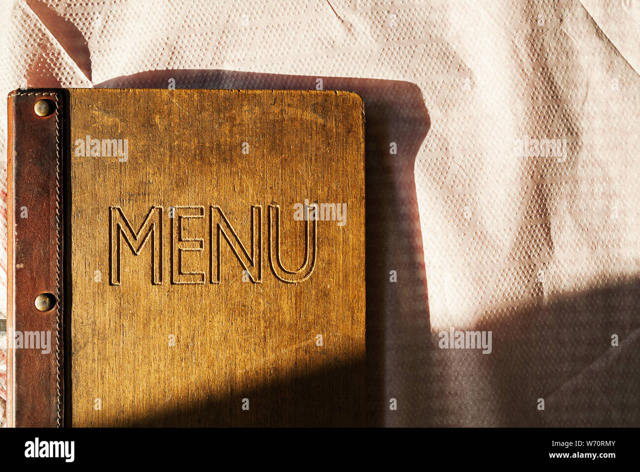 Details of an old restaurant menu book, closeup view. Stock Photo