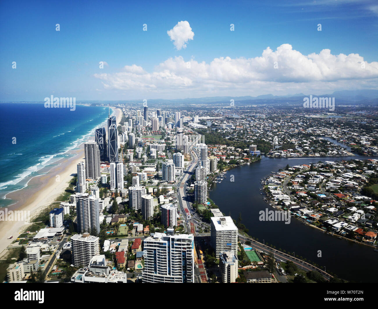 Surfers Paradise along the Gold Coast in Queensland, Australia - aerial view of the coastline with high rise hotels overlooking the beach. Stock Photo