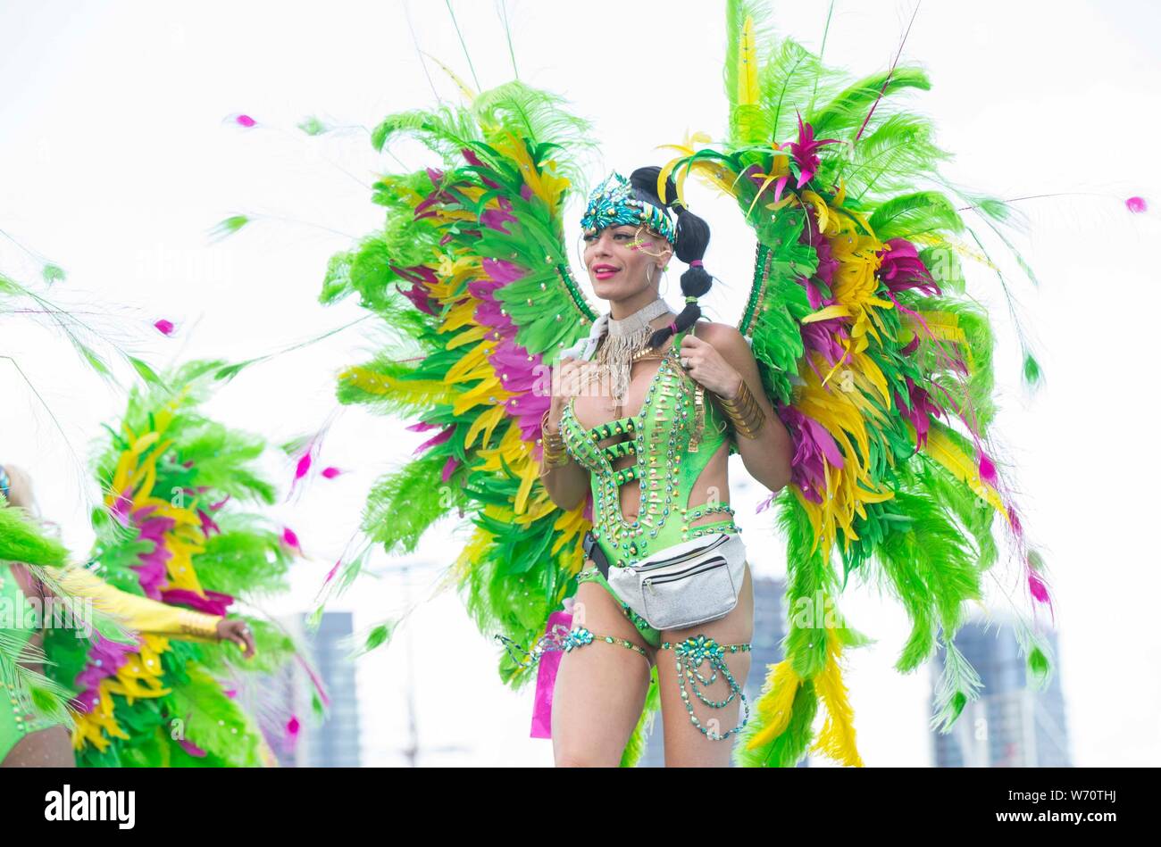 (190804) -- TORONTO, Aug. 4, 2019 (Xinhua) -- A dressed up reveller takes part in the 2019 Toronto Caribbean Carnival Grand Parade in Toronto, Canada, Aug. 3, 2019. People from near and far converged on the street for the annual Caribbean Carnival Grand Parade here on Saturday. (Xinhua/Zou Zheng) Stock Photo
