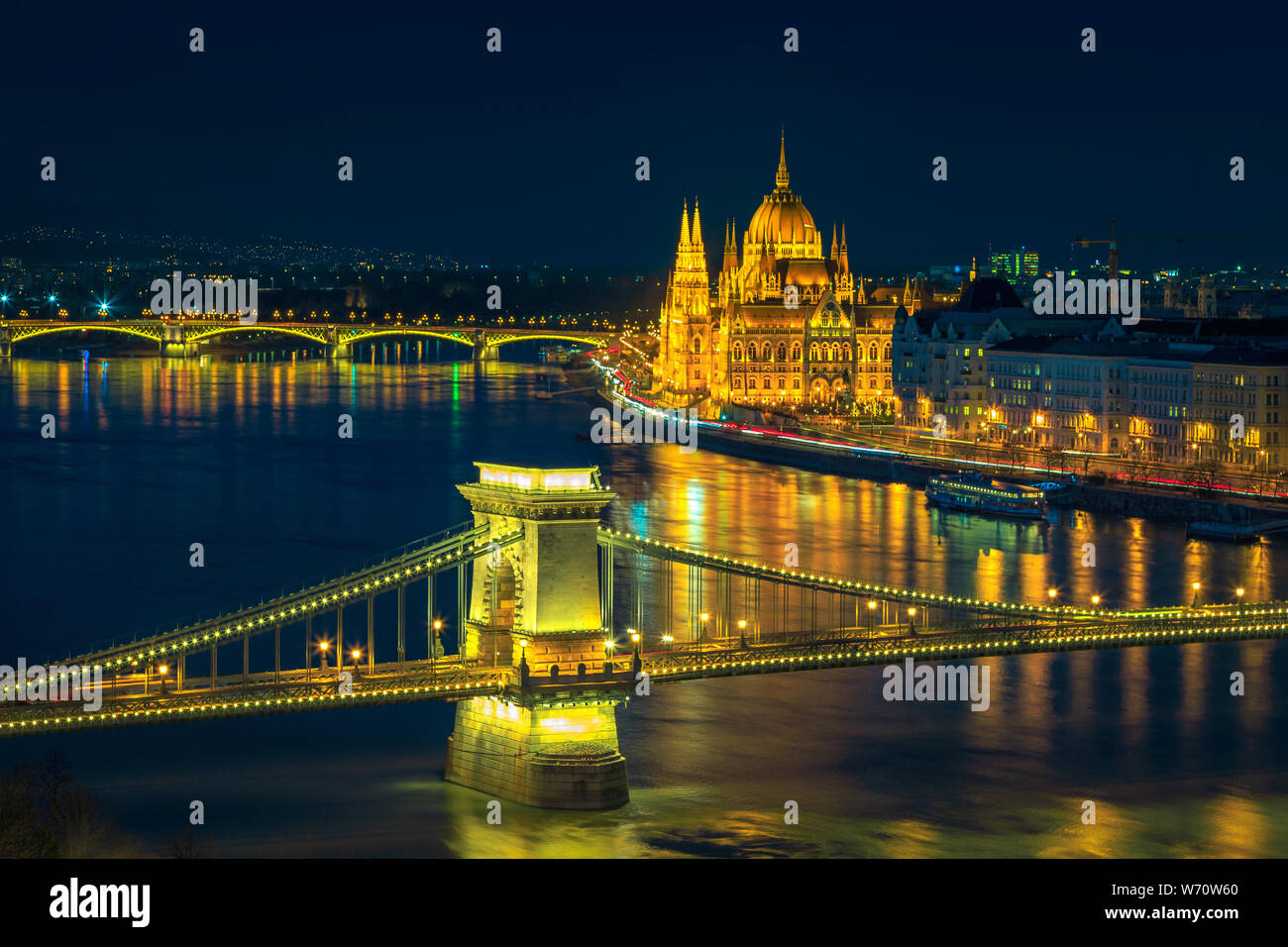Popular European touristic and travel destination. Picturesque cityscape panorama with amazing illuminated Chain bridge and Hungarian Parliament build Stock Photo