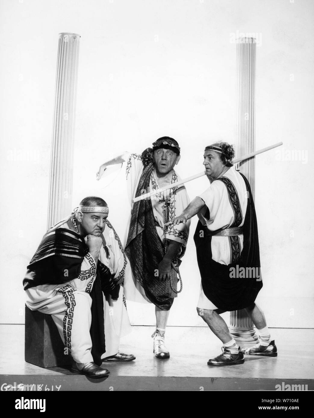 MOE HOWARD LARRY FINE and JOE De RITA as CURLY JOE in THE THREE STOOGES MEET HERCULES 1962 director Edward Bernds Normandy Productions / Columbia Pictures Stock Photo