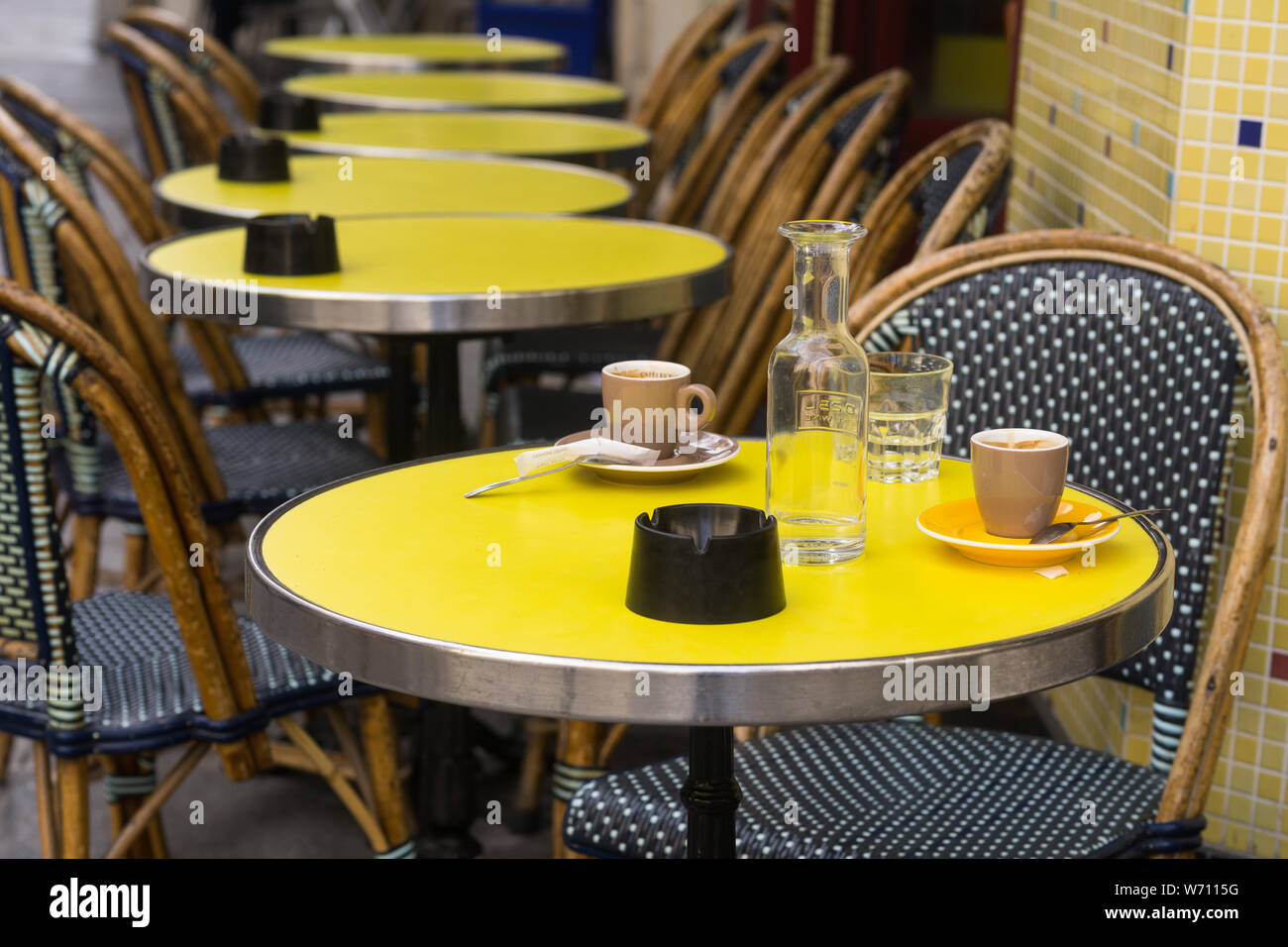 Paris cafe Marais Le Pick Clops - Empty coffee cups on table at Le Pick Clops, the cafe in Marais district in Paris, France, Europe. Stock Photo