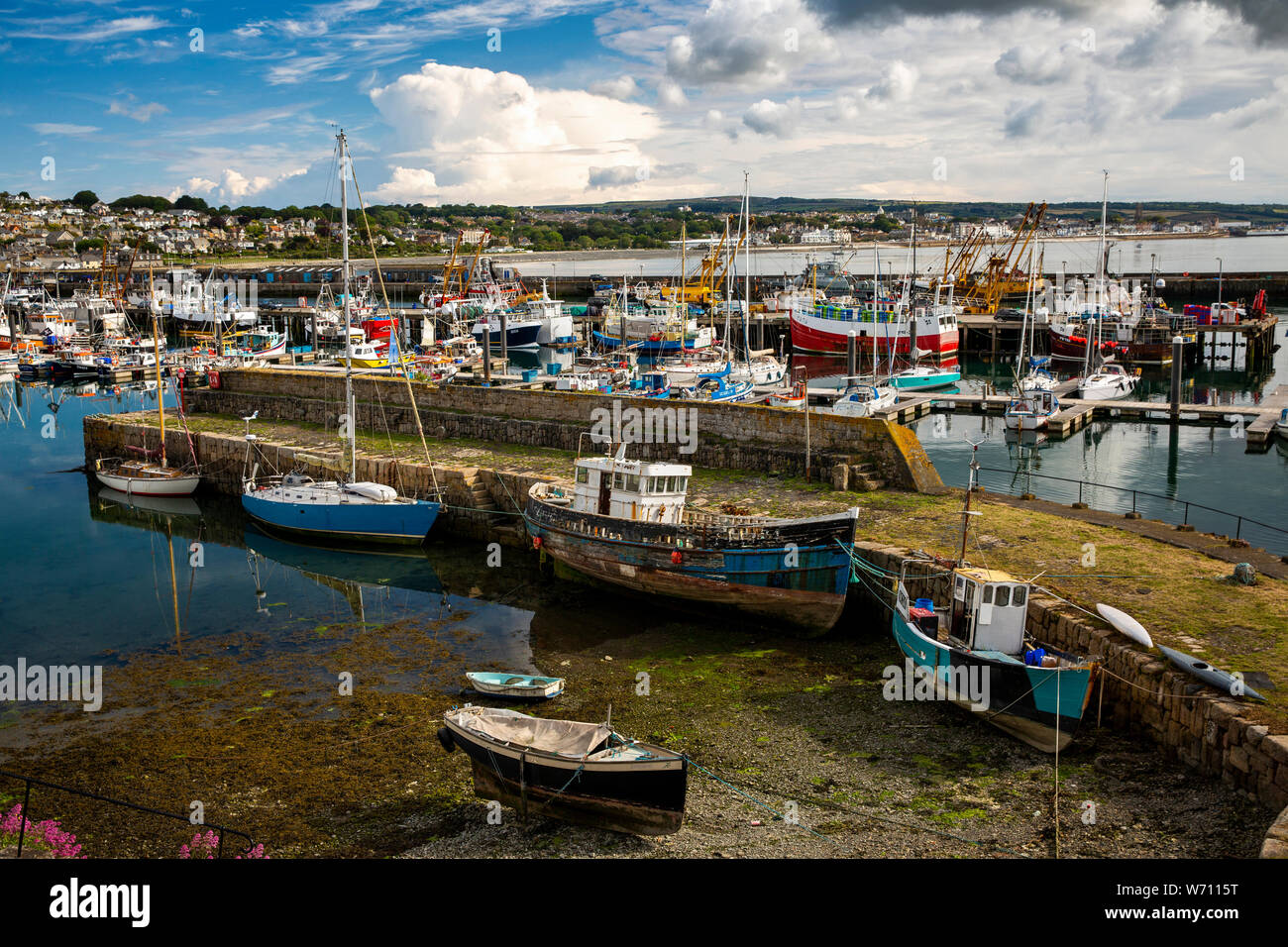 UK, England, Cornwall, Newlyn, Harbour, Old Quay and moored boats Stock Photo