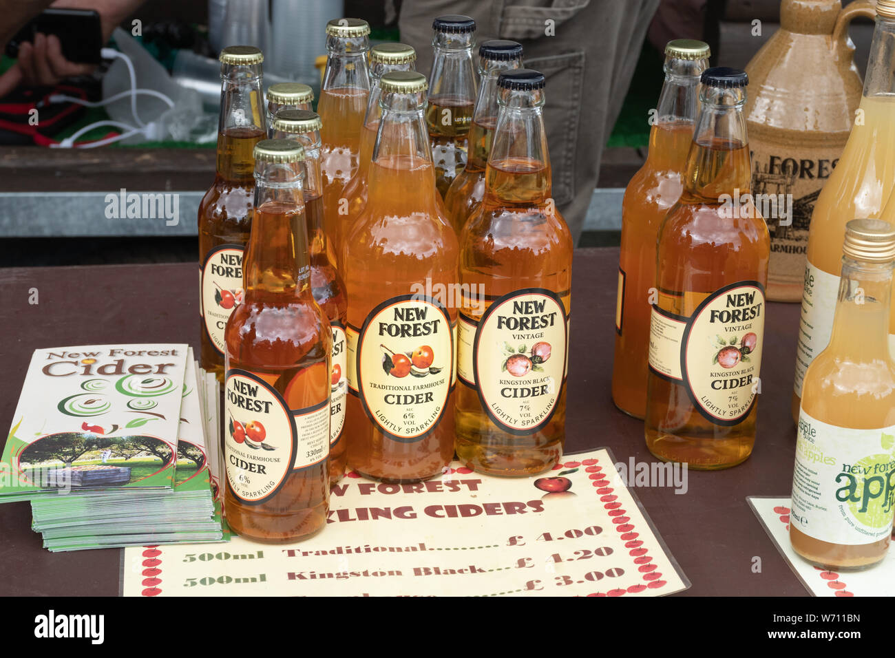 New Forest cider for sale on a trade stand at the New Forest and Hampshire County Show, UK Stock Photo