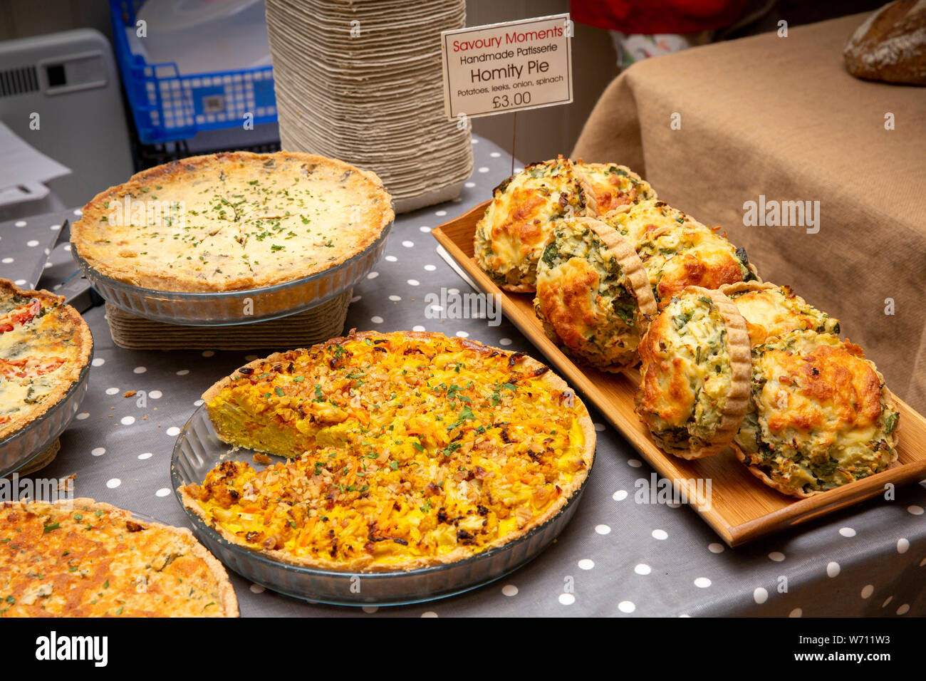 UK, England, Cornwall, Mousehole, Duck Street, Solomon Browne Memorial Hall, artizan market baked quiches and Homity Pie for sale Stock Photo