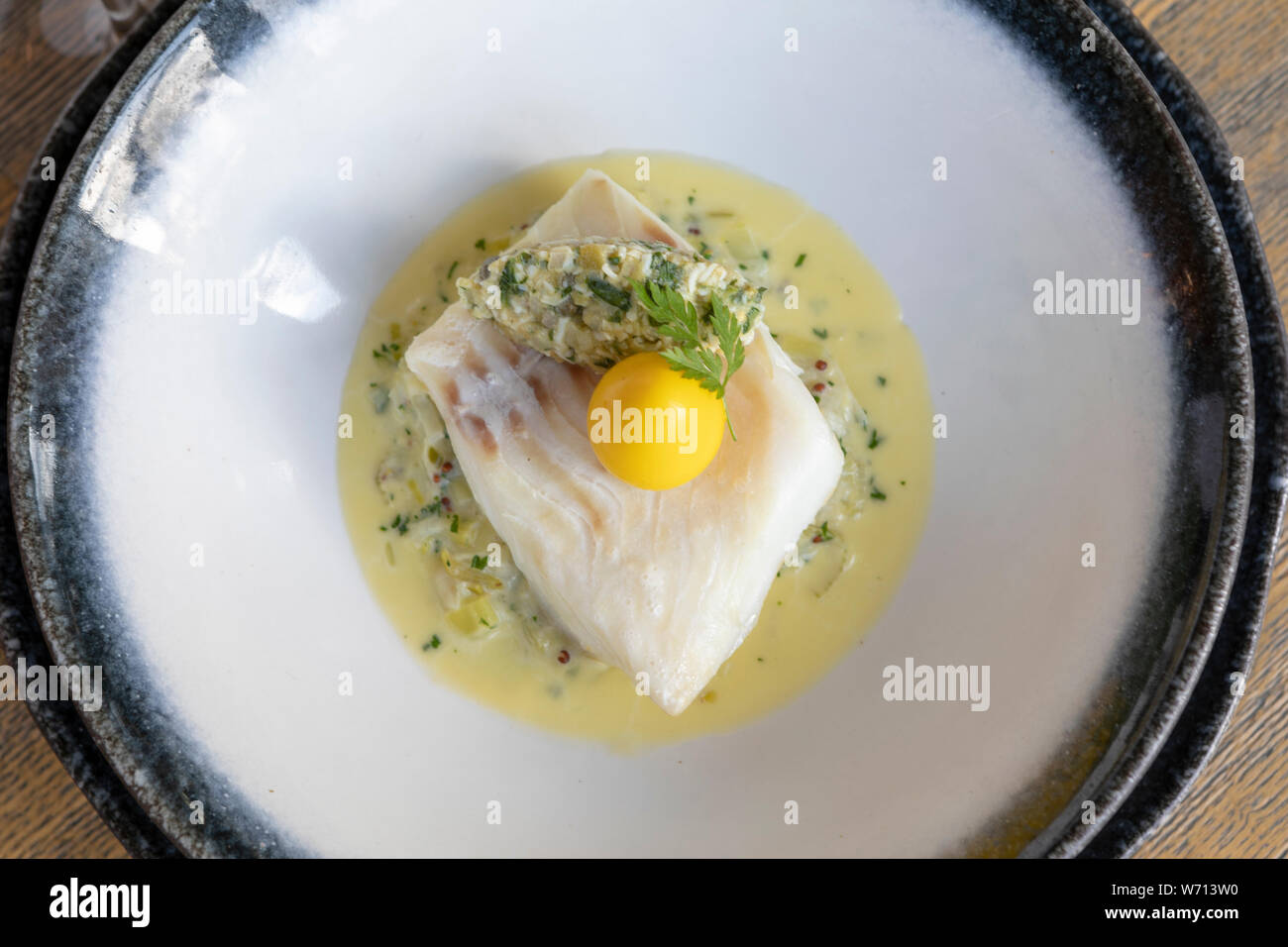 Haddock with Quails Egg Stock Photo Alamy
