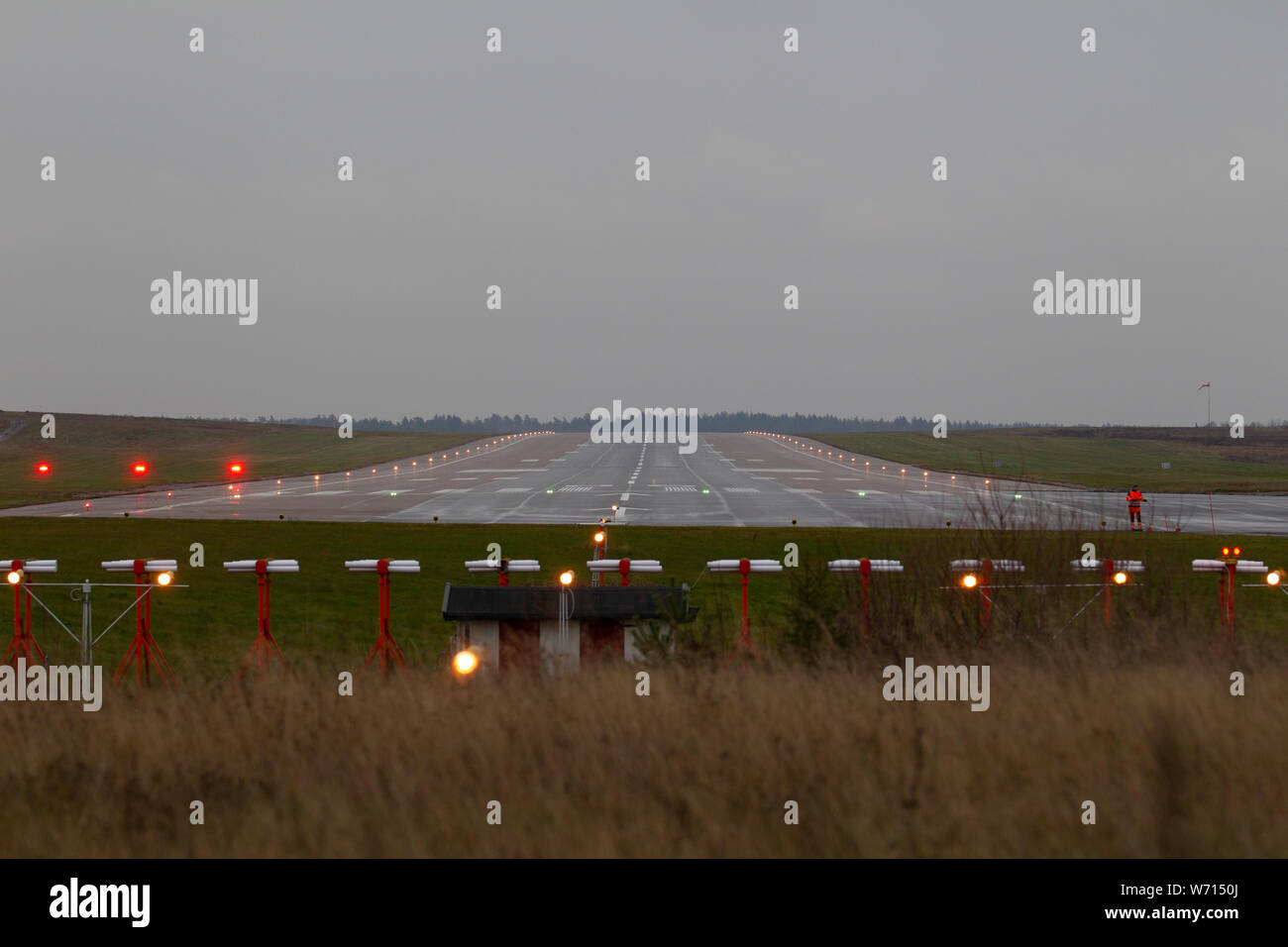 Runway on airfield one evening without airplane Stock Photo