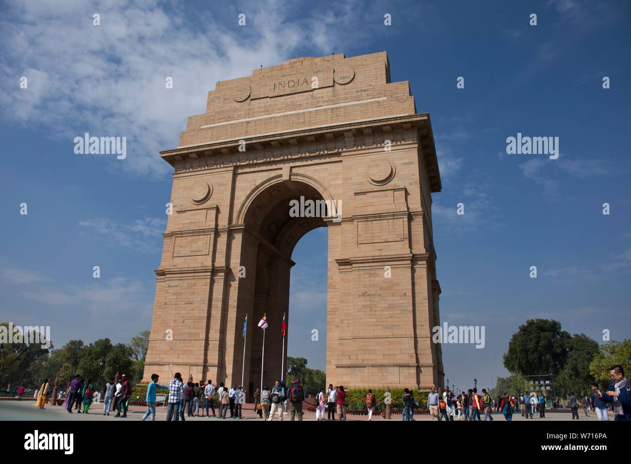 Indian people and foreigner travelers walking travel visit india Gate originally called the All India War Memorial at city of Delhi on March 17, 2019 Stock Photo