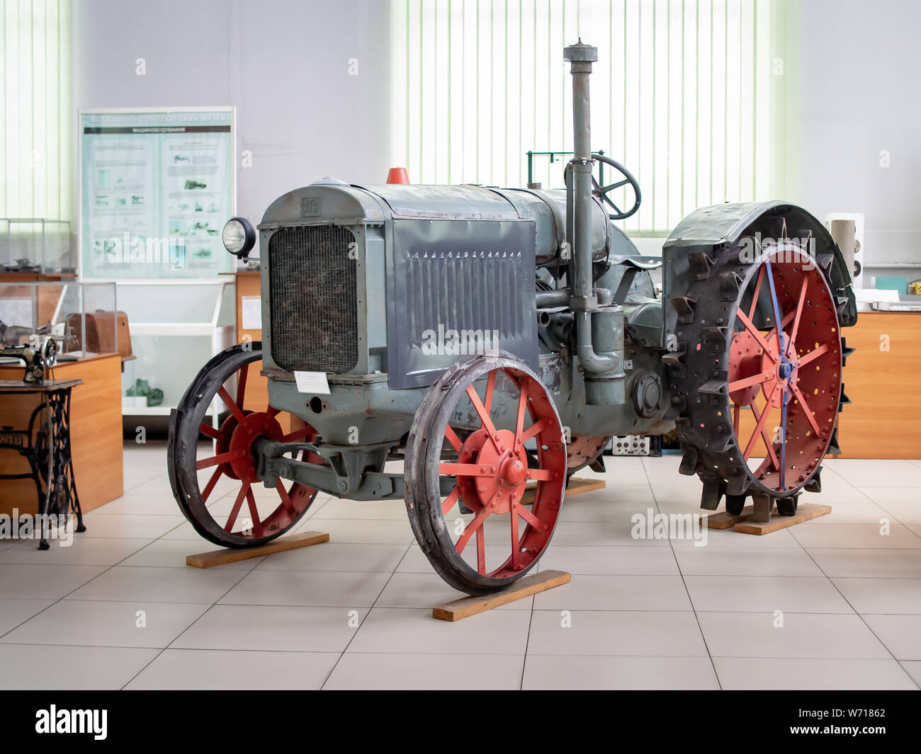 KIEV, UKRAINE-JULY 23, 2019: 1931 old Soviet tractor HTZ 15/30 in the Polytechnic Museum at Ukrainian National Technical University Stock Photo