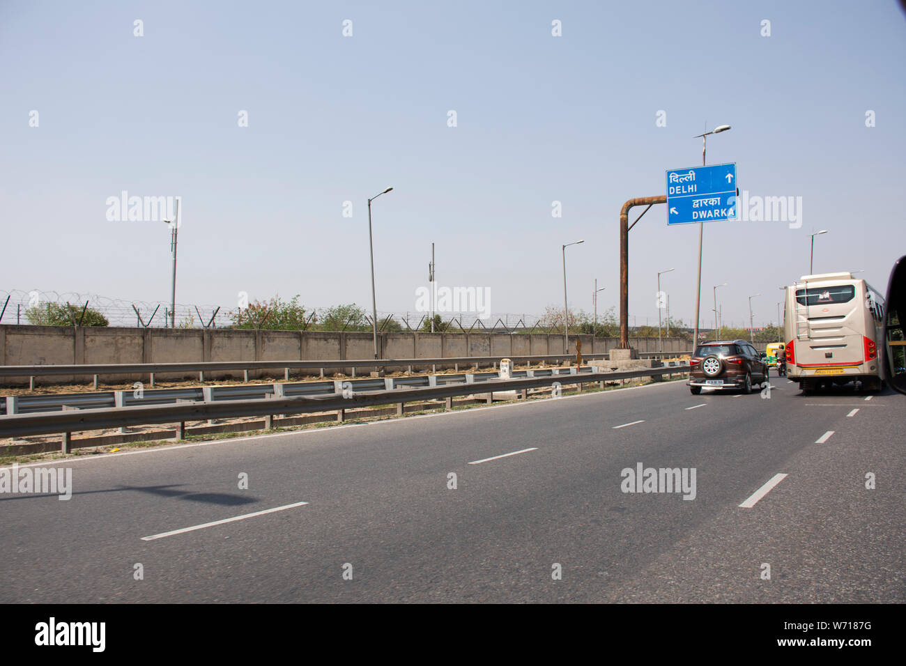 Indian people and foreigners drive car and ride motorcycle and bike