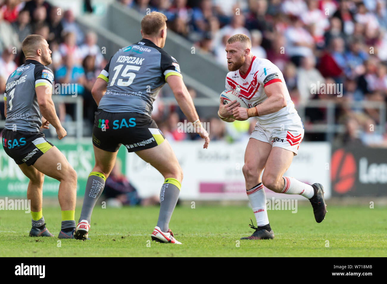 2nd August 2019 , Totally Wicked Stadium, St Helens, England;  Betfred Super League, Round 24, St Helens vs Wakefield Trinity ; Luke Thompson of St Helens looks for a way past Craig Kopczak of Wakefield Trinity  Credit: Richard Long/News Images Stock Photo